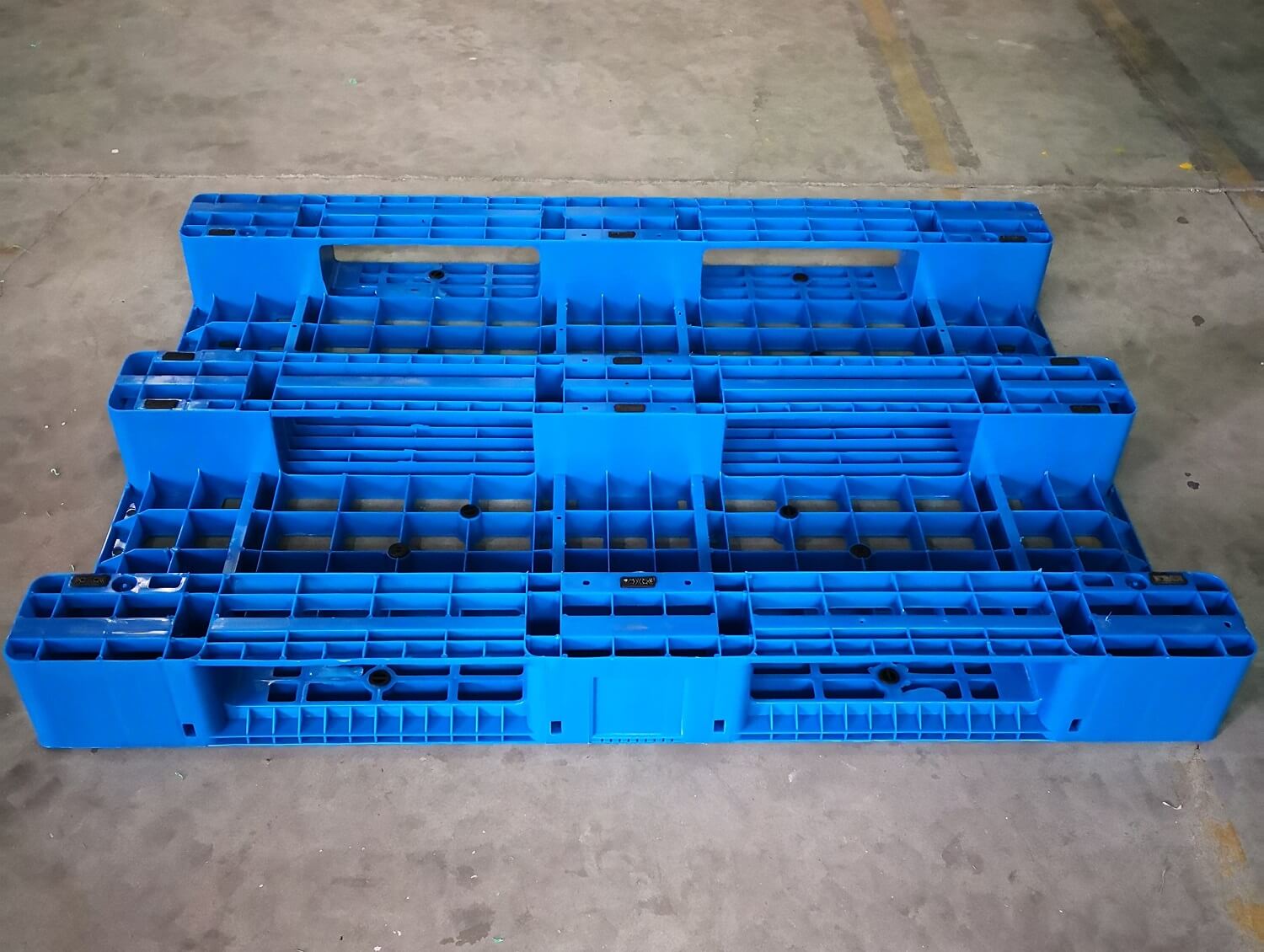 Wiederverwendbare 4-Wege-Netzpalette aus robustem, schachtelbarem Kunststoff